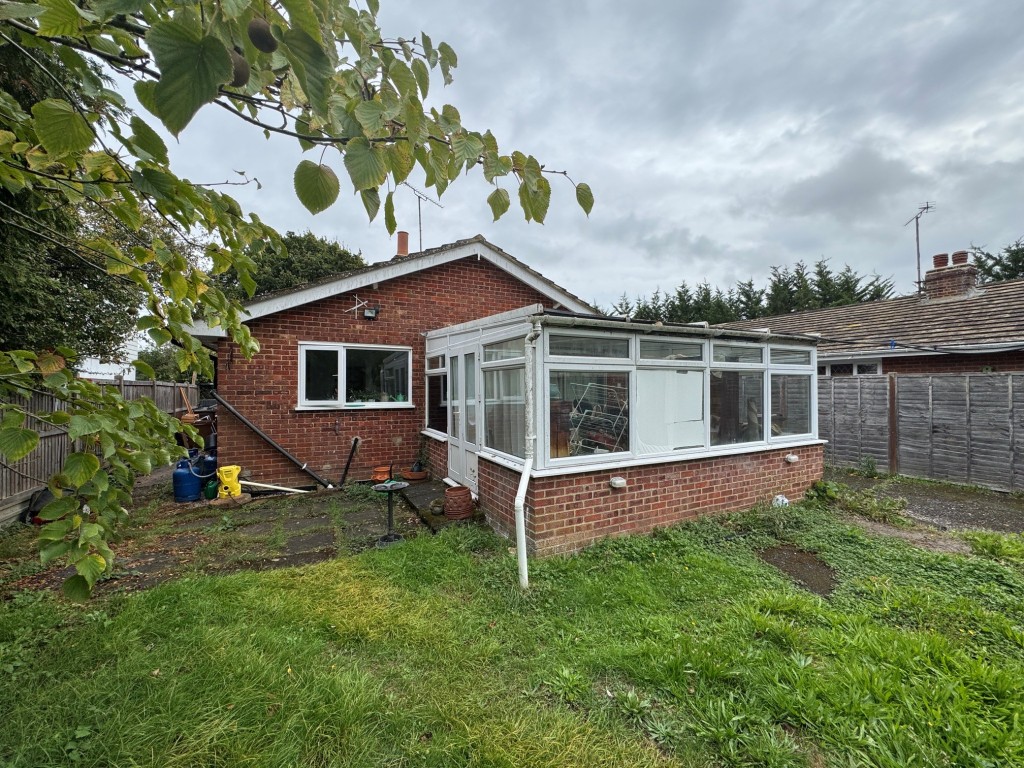 Lot: 152 - THREE-BEDROOM BUNGALOW FOR REFURBISHMENT AND REPAIR - Rear elevation